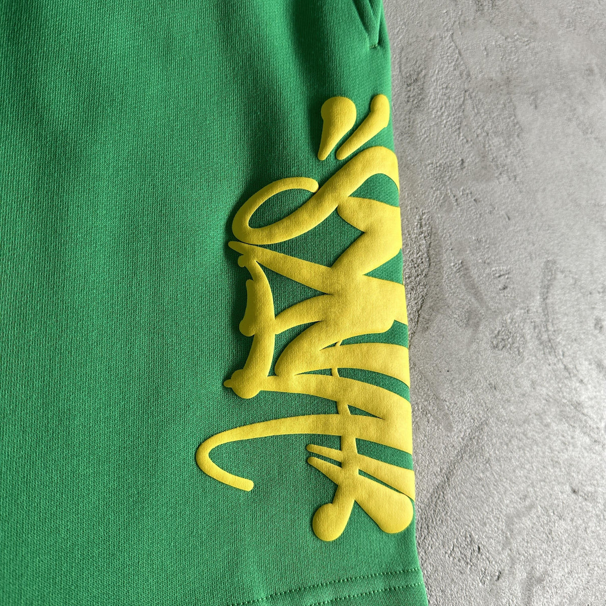 Tuta corta con cappuccio Synaworld