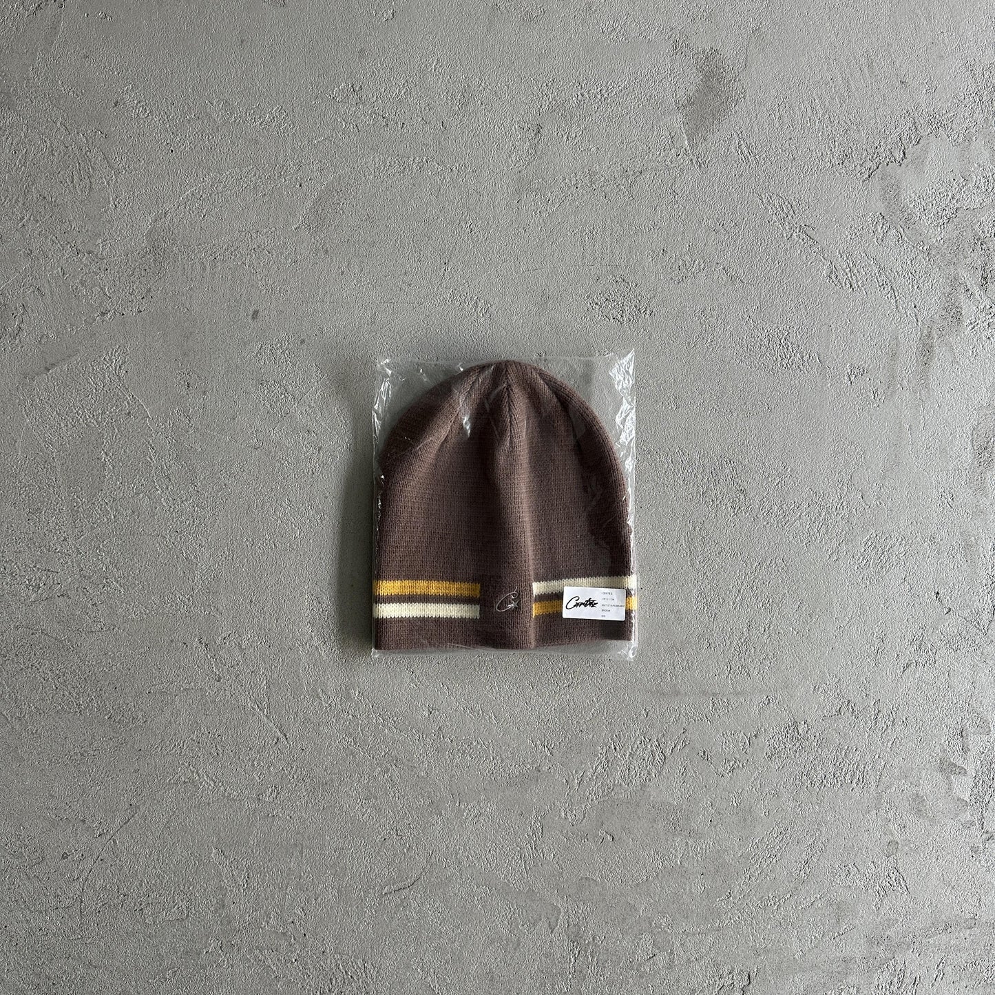 Bonnet rayé en maille Corteiz - Marron