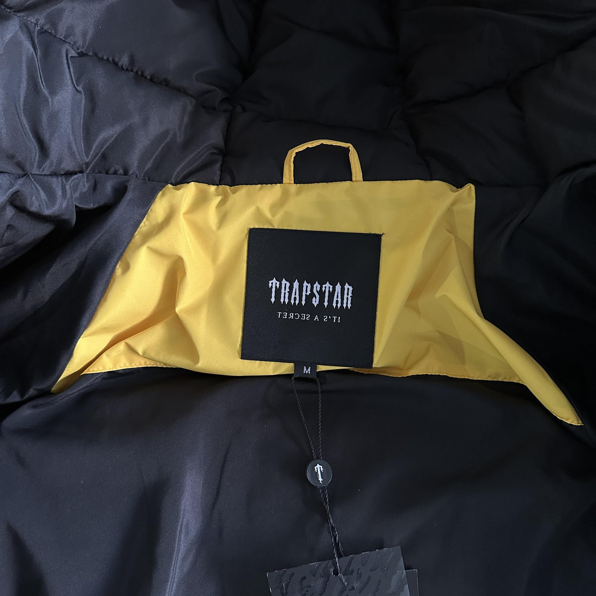 Trapstar Decoded Arch Puffer Jacket Nero Giallo