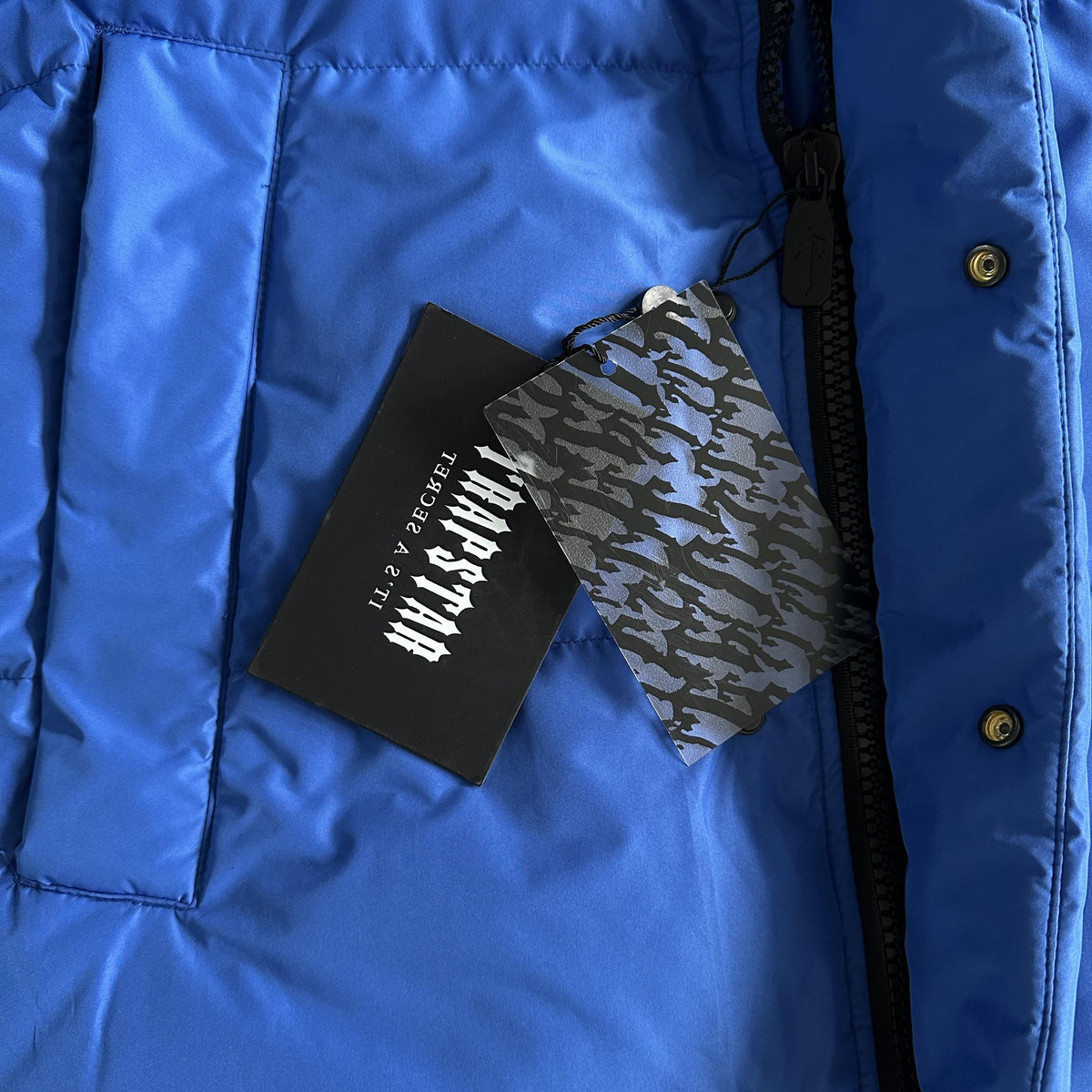 Chaqueta Acolchada Trapstar Decoded Arch Negra y Azul