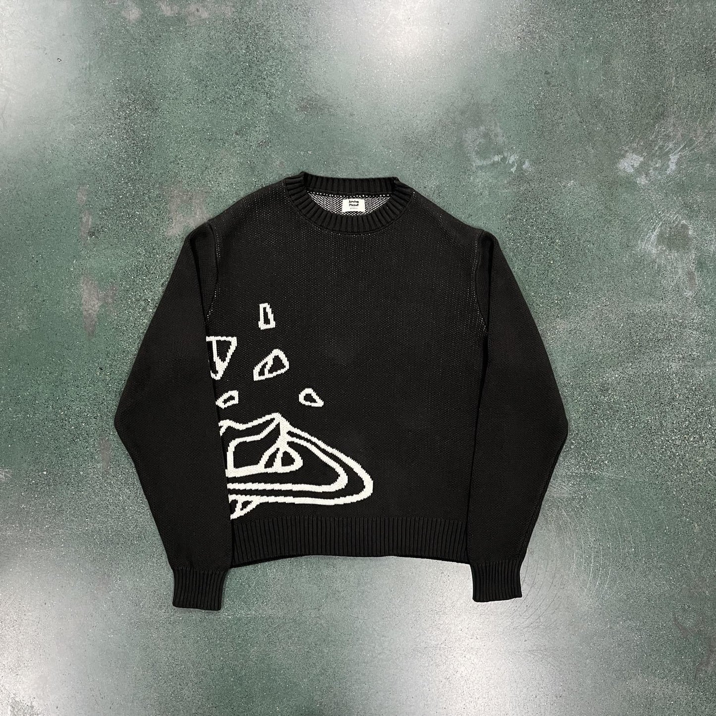 Pull en maille point cassé