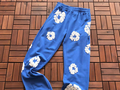 Denim Tears Le pantalon de jogging Cotton Wreath