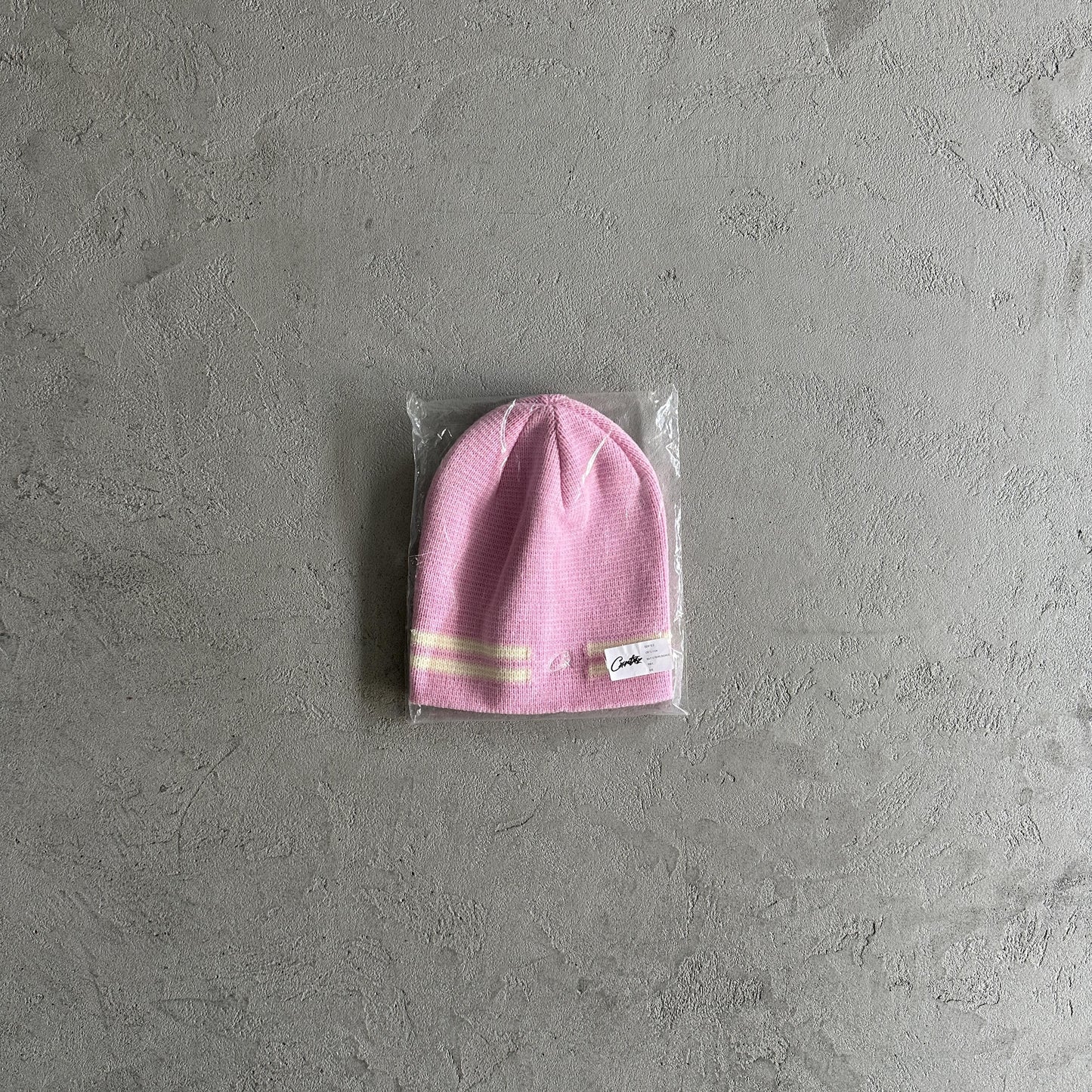 Bonnet à rayures en tricot Corteiz - Rose