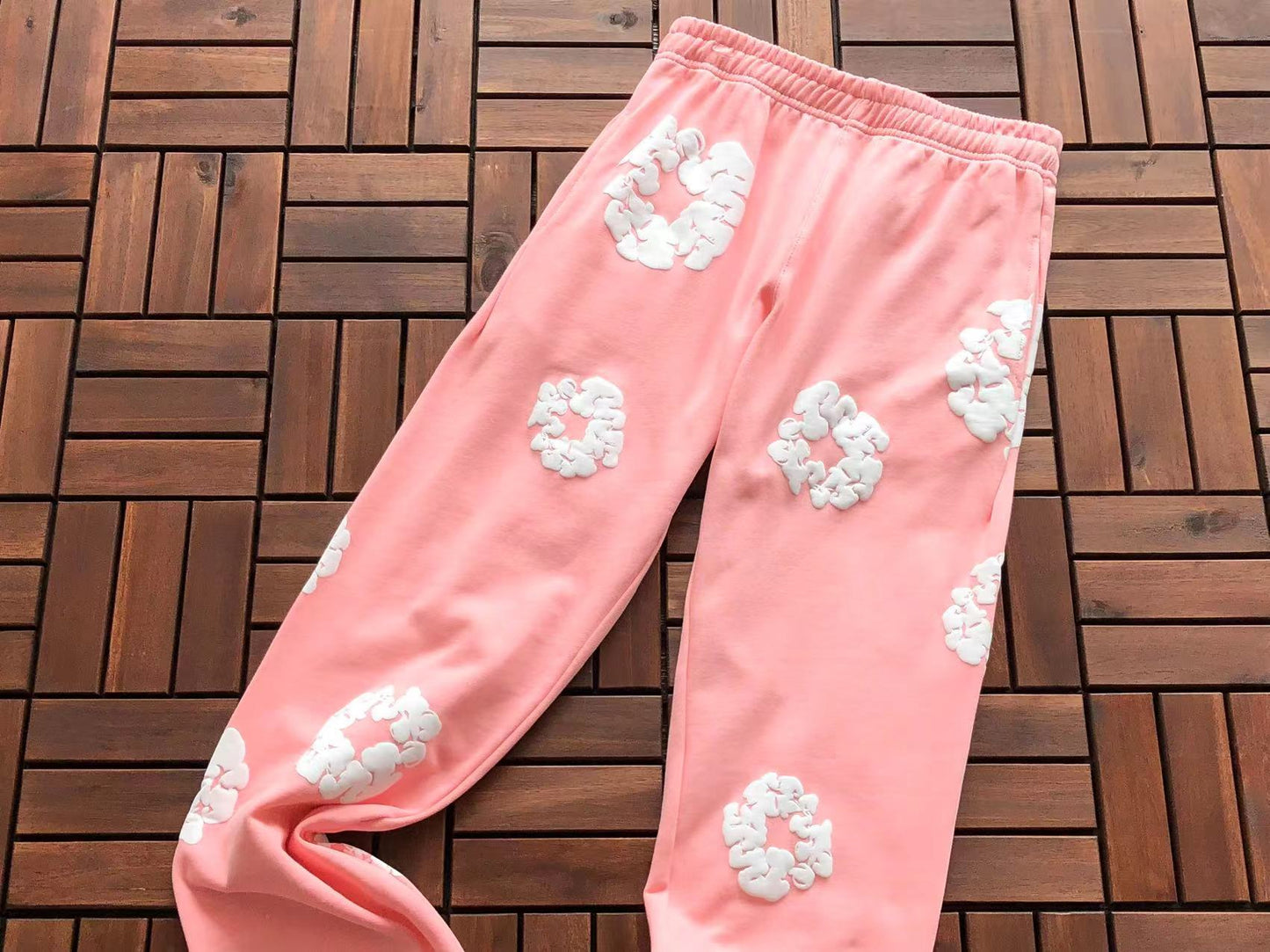 Denim Tears Le pantalon de jogging Cotton Wreath