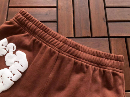 Denim Tears Le pantalon de jogging Cotton Wreath