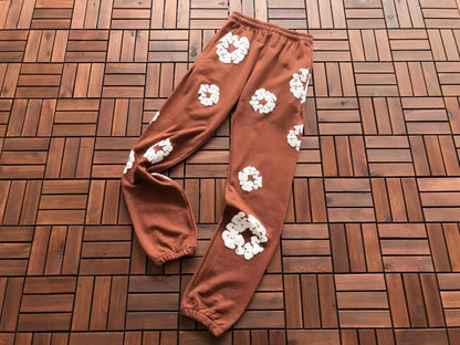 Denim Tears Le pantalon de jogging Cotton Wreath