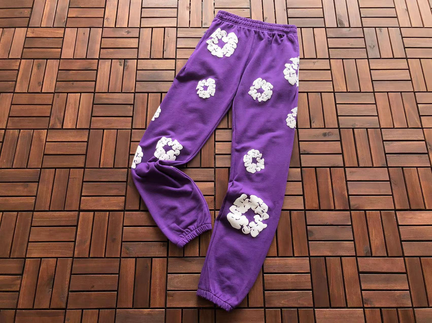 Denim Tears Le pantalon de jogging Cotton Wreath
