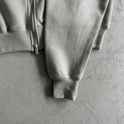 Combinaison zippée cassée en P