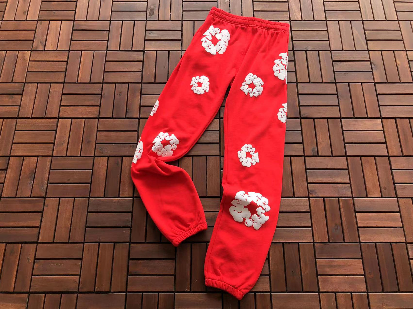 Denim Tears Le pantalon de jogging Cotton Wreath