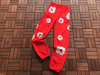 Denim Tears Le pantalon de jogging Cotton Wreath