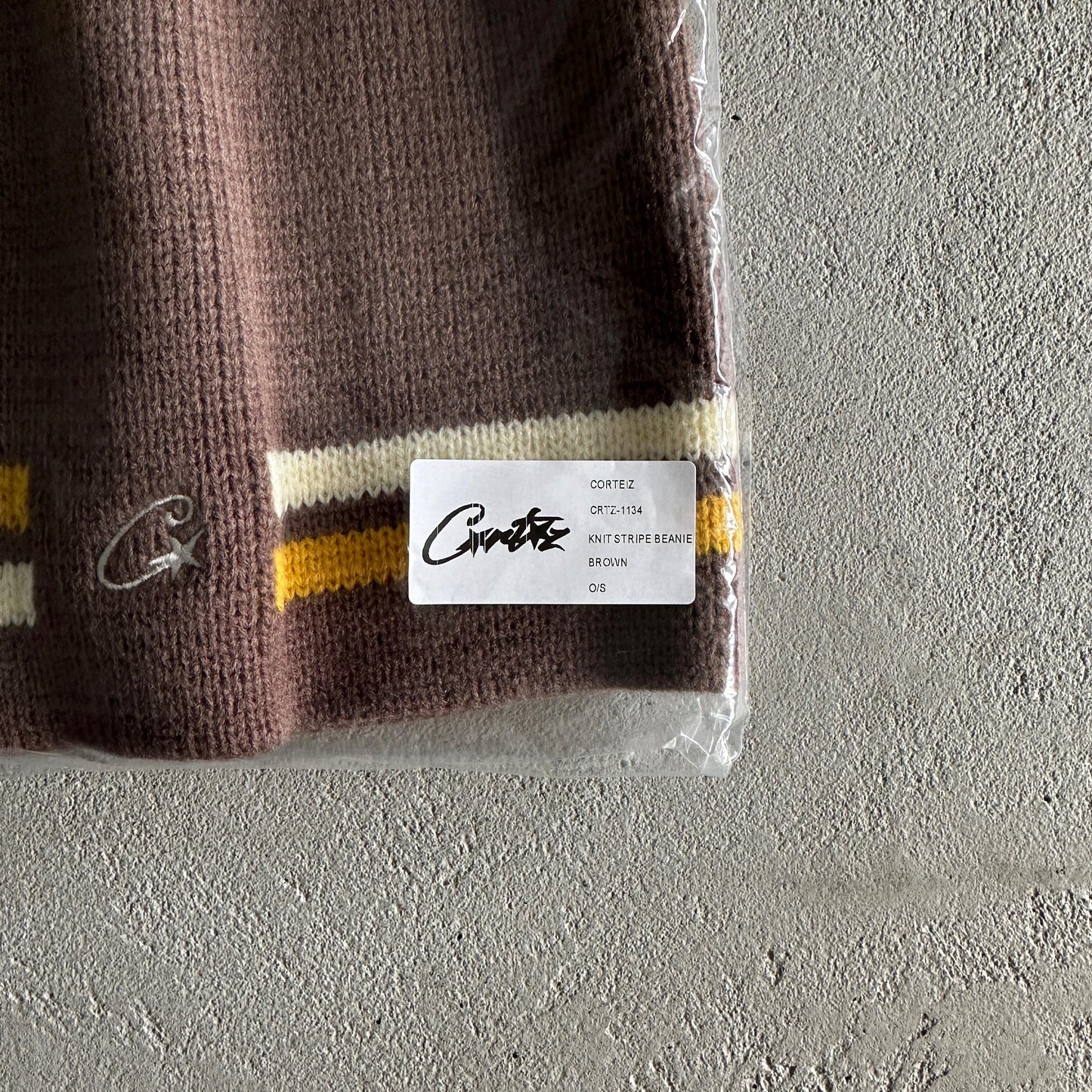Bonnet rayé en maille Corteiz - Marron