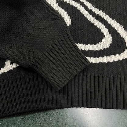 Pull en maille point cassé