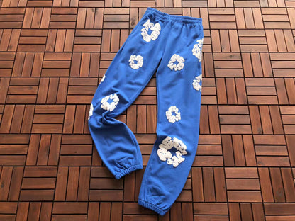 Denim Tears Le pantalon de jogging Cotton Wreath