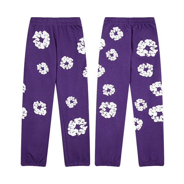 Denim Tears Le pantalon de jogging Cotton Wreath
