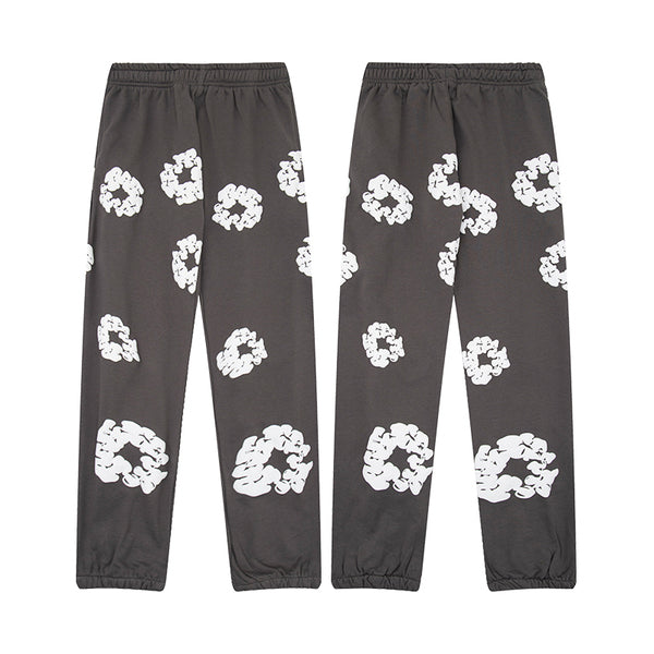 Denim Tears Le pantalon de jogging Cotton Wreath