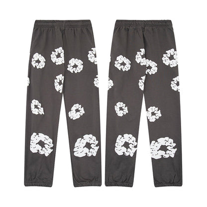 Denim Tears Le pantalon de jogging Cotton Wreath