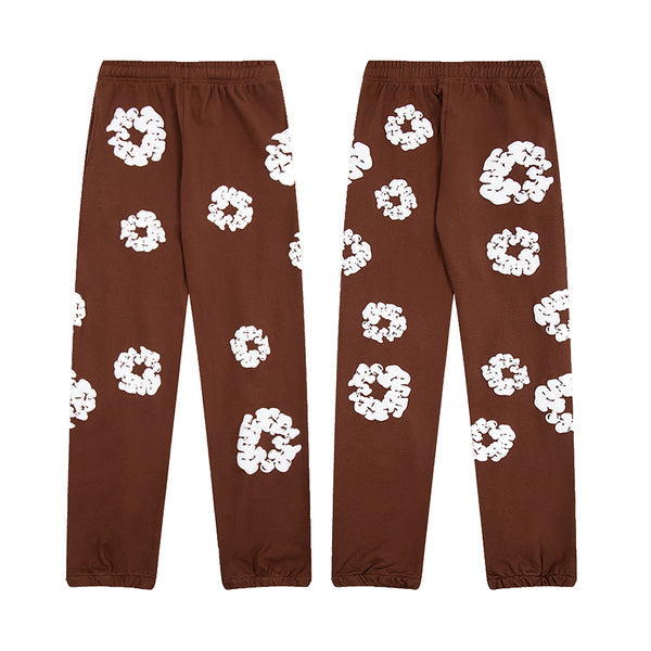 Denim Tears Le pantalon de jogging Cotton Wreath