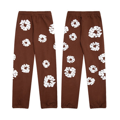 Denim Tears Le pantalon de jogging Cotton Wreath