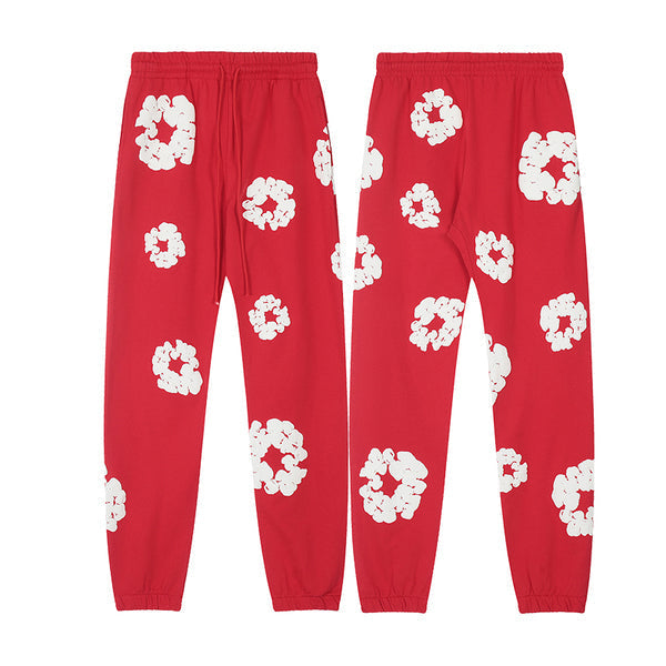 Denim Tears Le pantalon de jogging Cotton Wreath