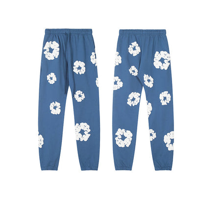Denim Tears Le pantalon de jogging Cotton Wreath