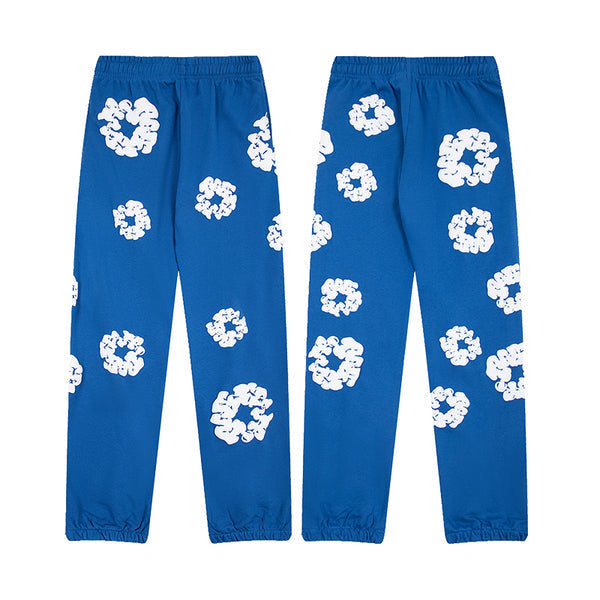 Denim Tears Le pantalon de jogging Cotton Wreath
