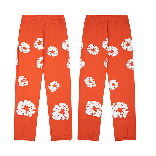Denim Tears Le pantalon de jogging Cotton Wreath