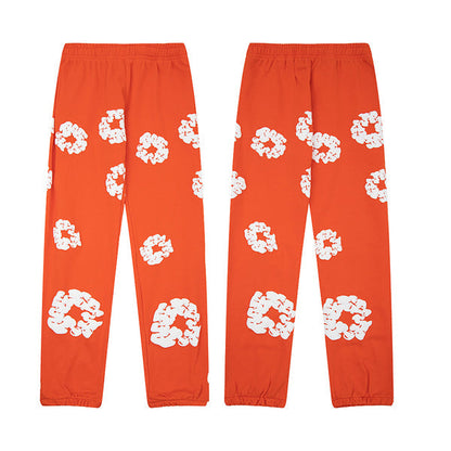 Denim Tears Le pantalon de jogging Cotton Wreath