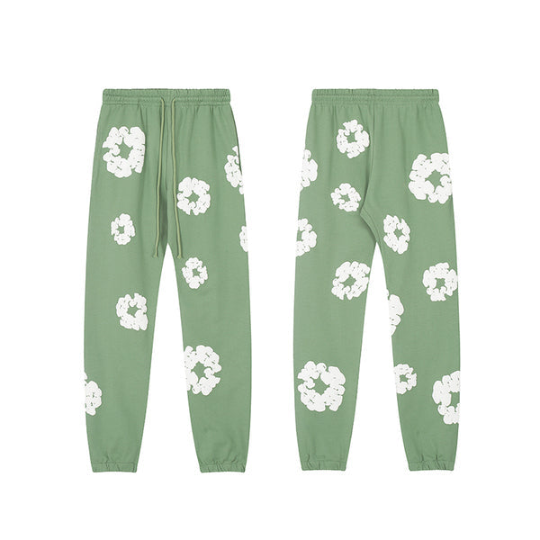 Denim Tears Le pantalon de jogging Cotton Wreath