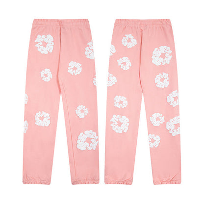 Denim Tears Le pantalon de jogging Cotton Wreath