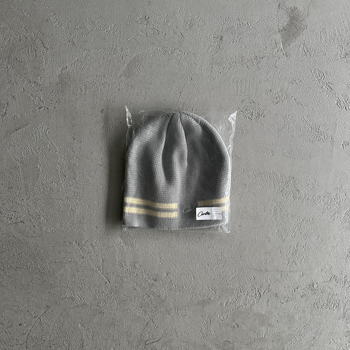 Bonnet rayé en maille Corteiz - Gris