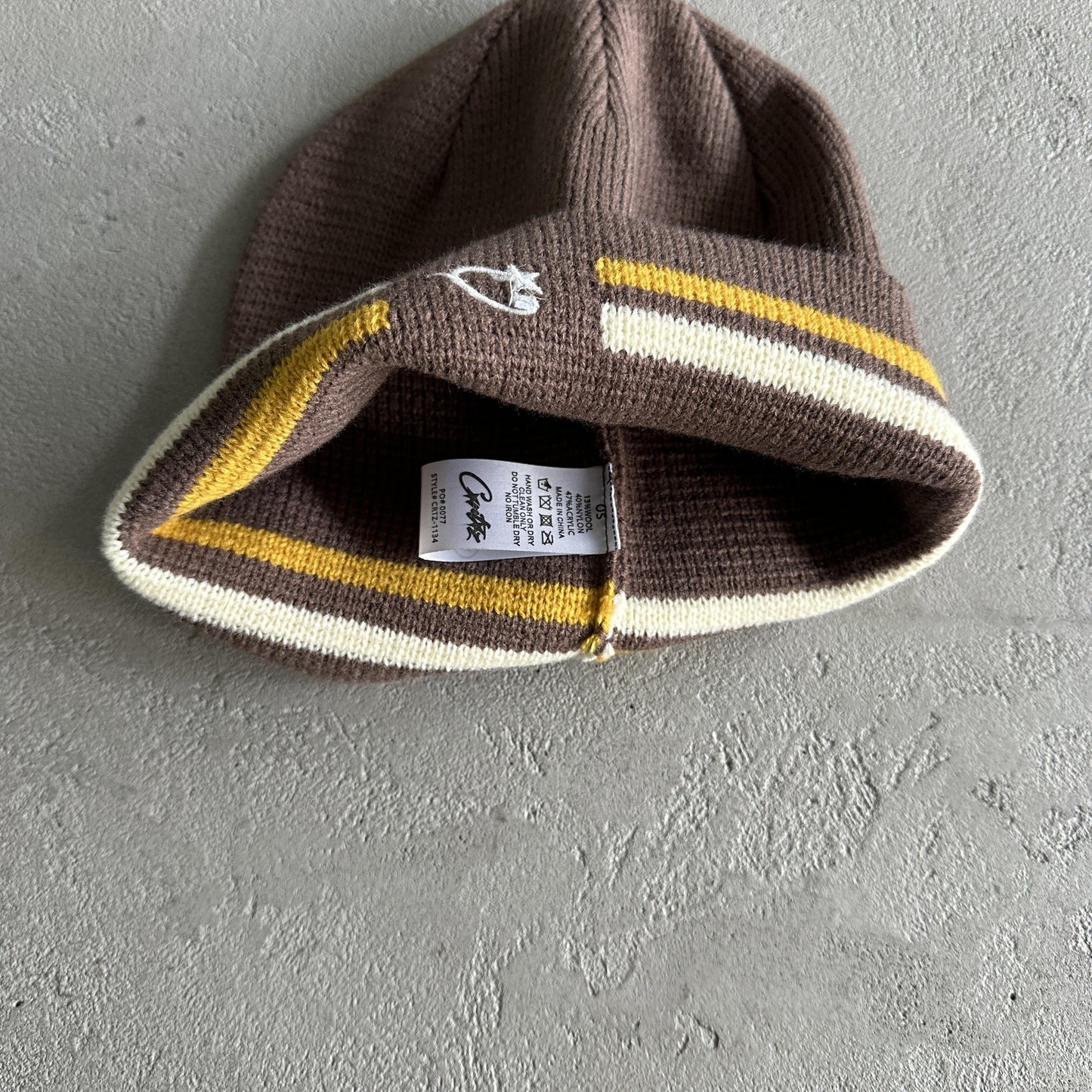 Bonnet rayé en maille Corteiz - Marron