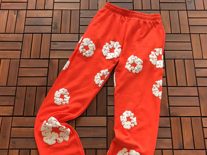 Denim Tears Le pantalon de jogging Cotton Wreath